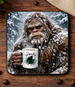 Bigfoot in a snowy scene holding a Sasquatch Coffee mug coffee coaster
